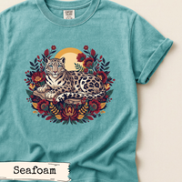 Load image into Gallery viewer, Snow Leopard Shirt Wilderness Nature Design Mountain Wildlife Apparel Rustic Forest Theme Graphic Tee Nature Lover Gift Animal Print Clothing Outdoor Adventure Style Earthy Tones Fashion Wild Cat Design Botanical Elements Decorative Foliage