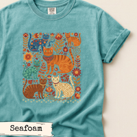 Load image into Gallery viewer, Nature Enthusiast Shirt Cat Lover Design Botanical Woodland Print Multiple Cat Pattern Floral Foliage Illustration Forest Theme Apparel Orange Blue Green Cream Colors Cottagecore Boho Fashion Artistic Clothing Gift For Animal Lover Outdoor