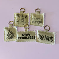 Load image into Gallery viewer, Decorative Bag Charm Keychain Handmade Motivational Accessory Inspirational Quote Design Positive Affirmation Gift Personalized Purse Charm Backpack Zipper Pull Attachment Scalloped Edge Fabric Patch Colorful Border Pattern Plaid Floral